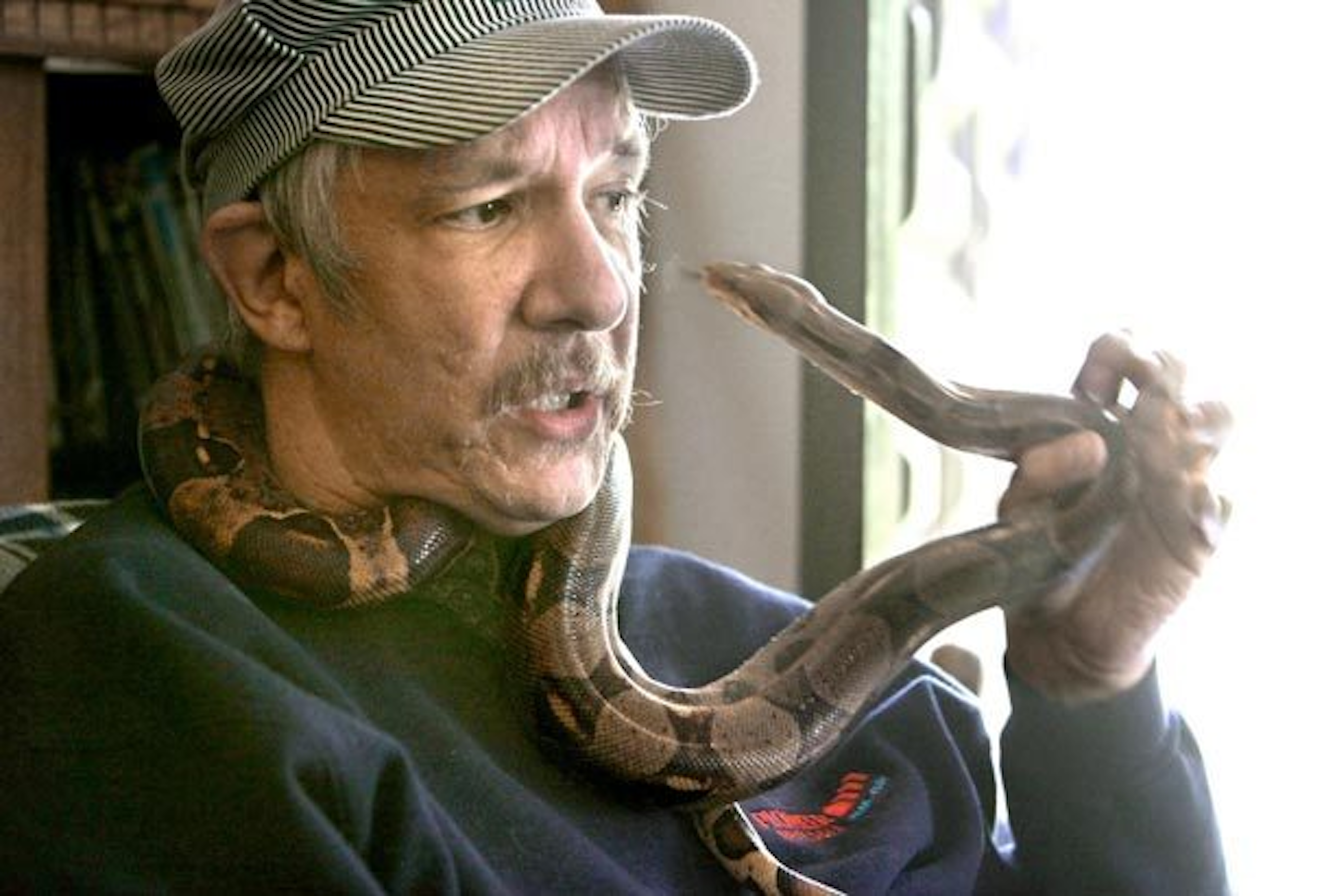 man and a snake